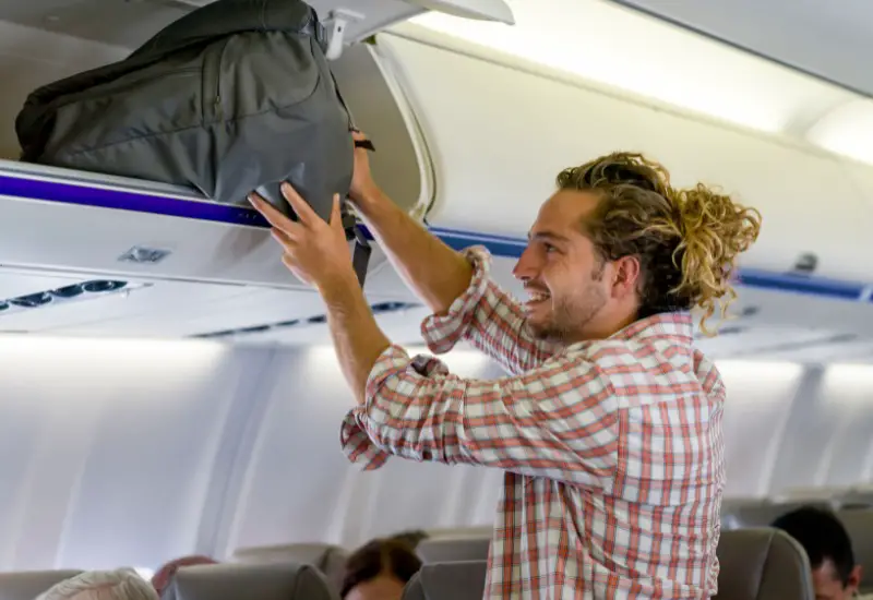 Why Flight Attendants Won’t Help You Lift Your Luggage